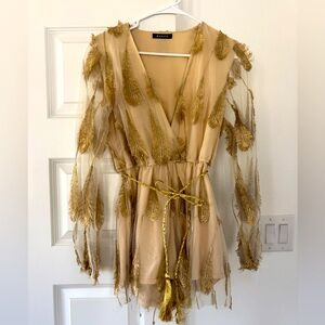 Romper size small. Worn once.